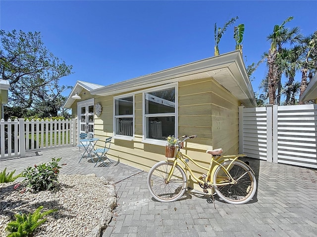 back of property with fence