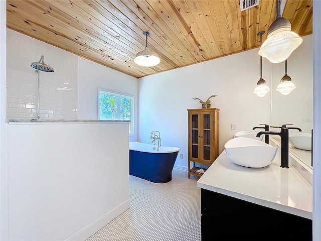 bathroom featuring wooden ceiling, double vanity, a soaking tub, visible vents, and a sink