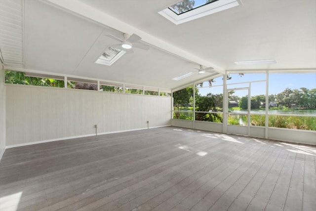 3610 Pershing Ave, Orlando, FL 32812 - unfurnished sunroom featuring ceiling fan, a skylight, and a water view