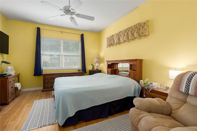 3312 92nd Ave E, Parrish, FL 34219 - bedroom featuring light wood-style floors and a ceiling fan