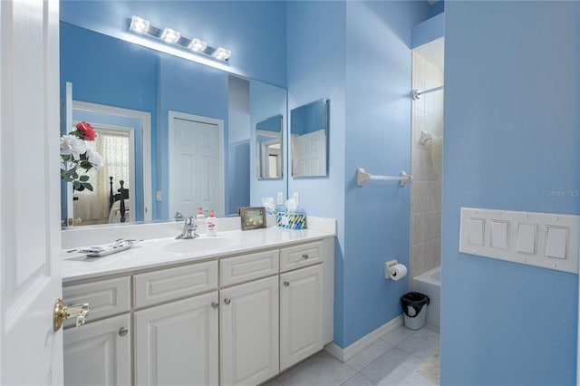 3312 92nd Ave E, Parrish, FL 34219 - bathroom with tile patterned floors, vanity, and tub / shower combination
