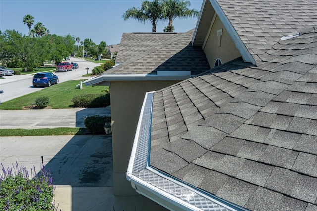 3312 92nd Ave E, Parrish, FL 34219 - detailed view of a shingled roof and stucco siding