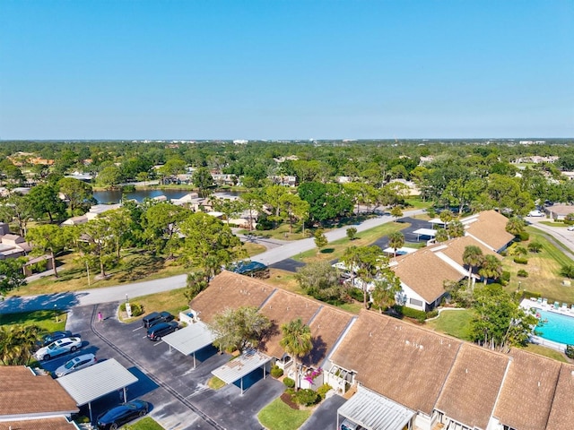 bird's eye view with a water view and a residential view