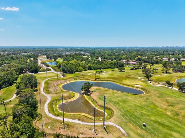 bird's eye view featuring a water view and view of golf course