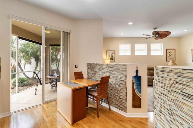 dining room with recessed lighting, light wood-style flooring, ceiling fan, and baseboards