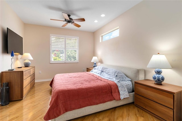 bedroom featuring recessed lighting, baseboards, a ceiling fan, and light wood-type flooring