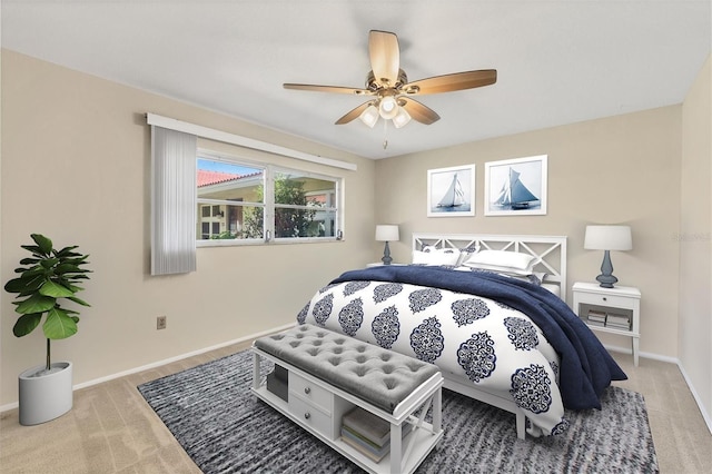 2267 Pueblo Ln Unit V40, Sarasota, FL 34231 - bedroom featuring carpet, baseboards, and a ceiling fan