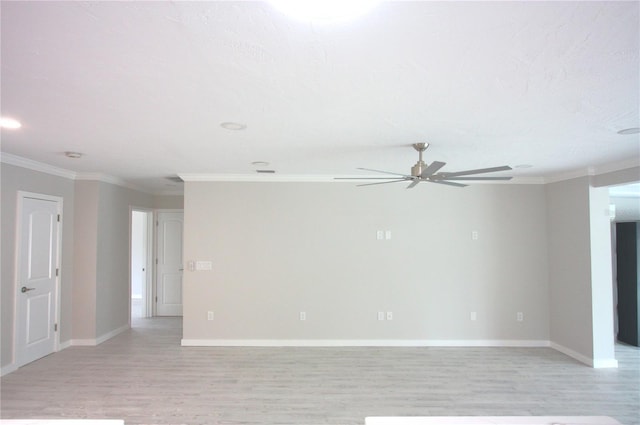 306 Island Cir, Sarasota, FL 34242 - spare room featuring ornamental molding, light wood finished floors, baseboards, and a ceiling fan