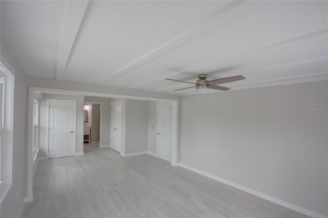 306 Island Cir, Sarasota, FL 34242 - interior space featuring baseboards, a ceiling fan, and light wood-style floors