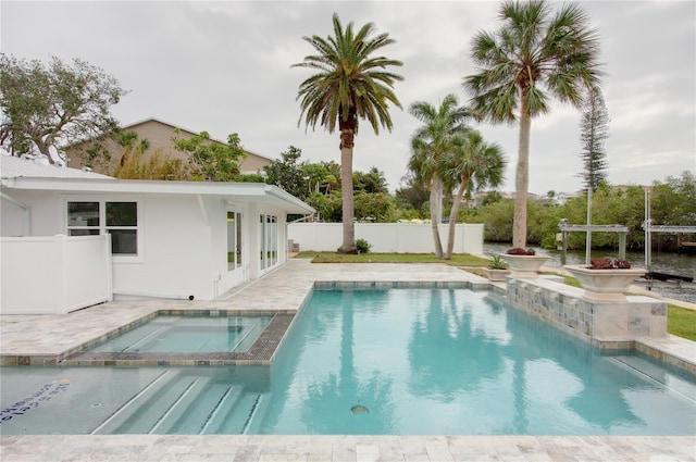 306 Island Cir, Sarasota, FL 34242 - view of swimming pool with a fenced in pool, a patio, a pergola, an in ground hot tub, and fence