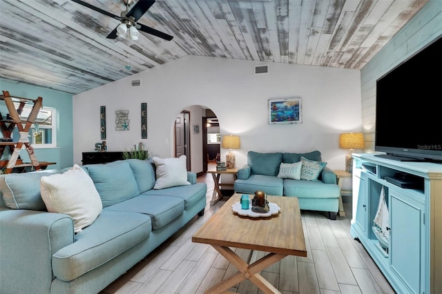 23088 Allen Ave, Port Charlotte, FL 33980 - living area featuring arched walkways, ceiling fan, lofted ceiling, and wood tiled floors