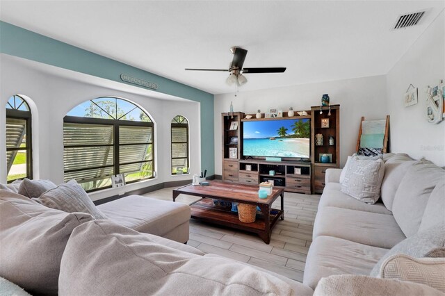 23088 Allen Ave, Port Charlotte, FL 33980 - living area with a ceiling fan and wood finished floors