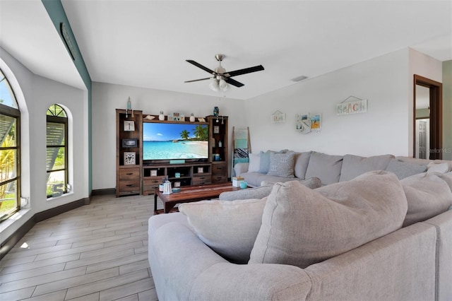 23088 Allen Ave, Port Charlotte, FL 33980 - living area featuring ceiling fan and light wood finished floors