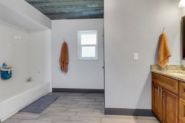 23088 Allen Ave, Port Charlotte, FL 33980 - full bathroom with vanity, a tub to relax in, and wood finish floors