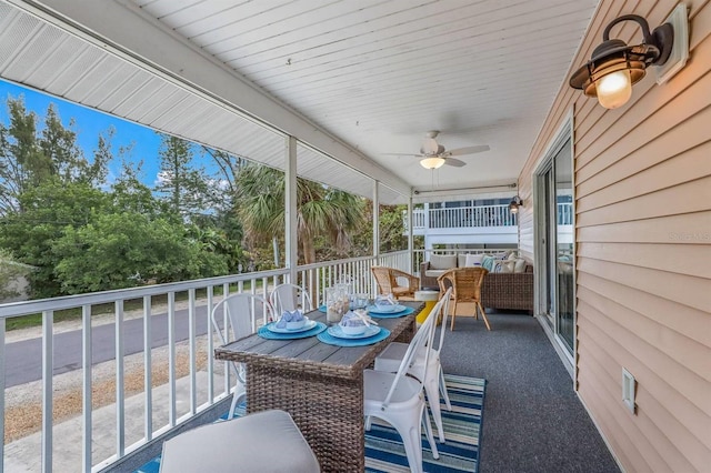 sunroom / solarium with ceiling fan