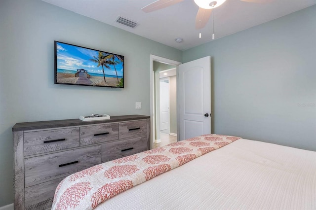 bedroom featuring visible vents and ceiling fan