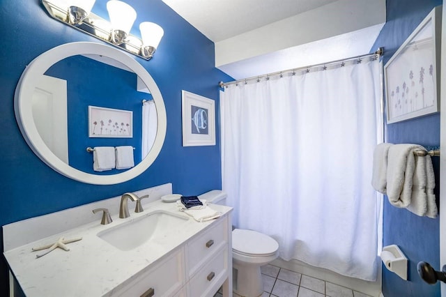 full bathroom with tile patterned flooring, vanity, and toilet