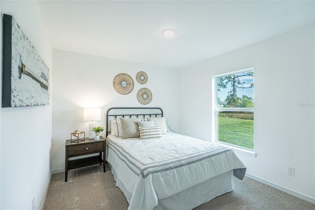 1098 Fletcher St, Port Charlotte, FL 33952 - carpeted bedroom with baseboards