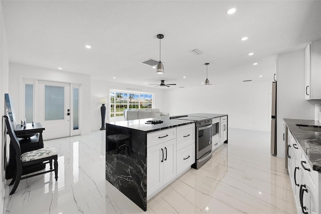 kitchen featuring visible vents, stainless steel electric stove, marble finish floor, and recessed lighting