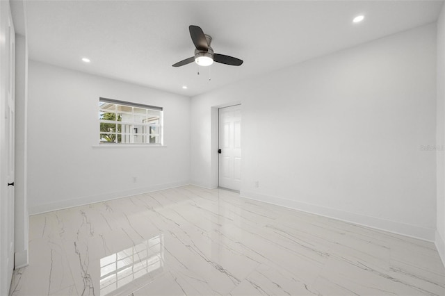 empty room featuring ceiling fan, baseboards, and recessed lighting