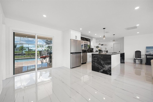 kitchen with appliances with stainless steel finishes, marble finish floor, visible vents, and recessed lighting