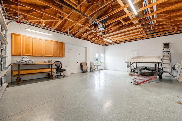 garage featuring a garage door opener