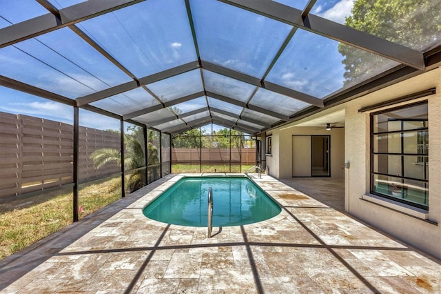 view of pool with a lanai, a patio area, a fenced backyard, and a fenced in pool