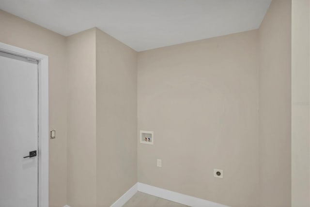 clothes washing area with electric dryer hookup, baseboards, laundry area, and hookup for a washing machine