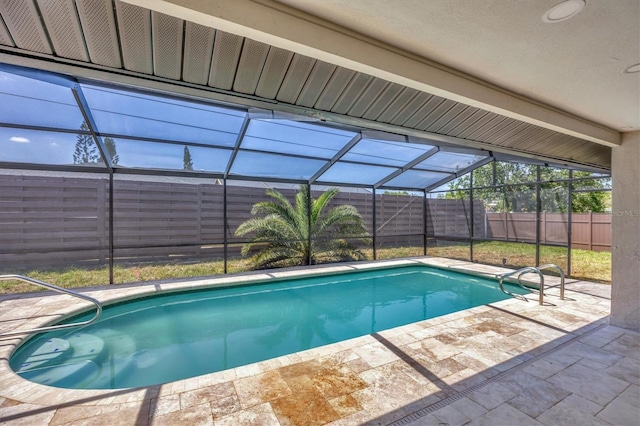 view of pool featuring a fenced backyard, a lanai, a patio, and a fenced in pool