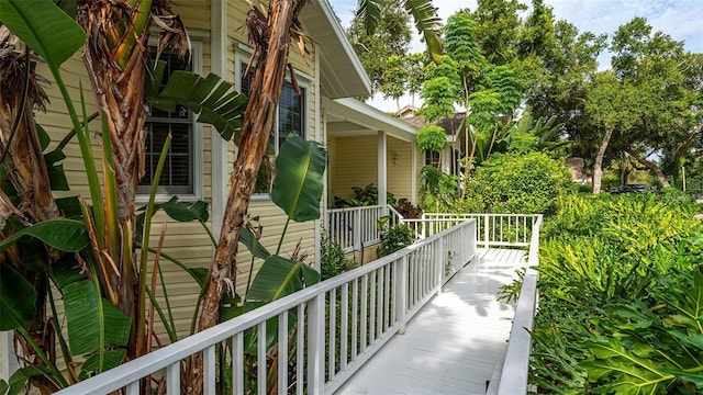 view of side of home featuring a porch