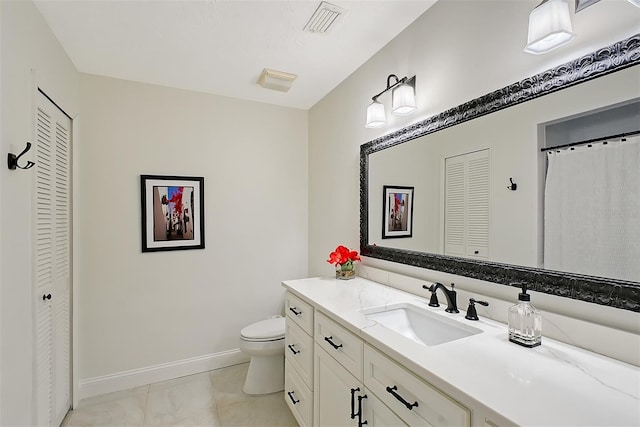 full bathroom with vanity, baseboards, a closet, and toilet