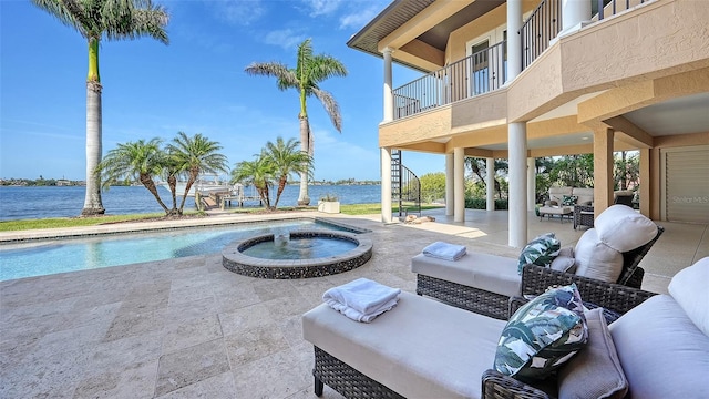 view of swimming pool with stairway, a patio, an outdoor living space, and a water view