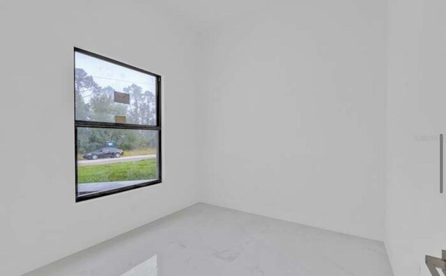 unfurnished room with plenty of natural light