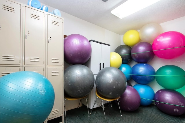 exercise area with carpet flooring