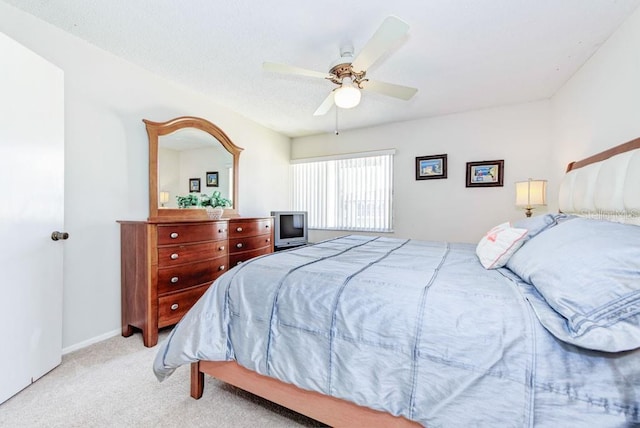 bedroom with carpet flooring and a ceiling fan