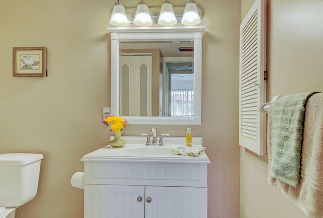 half bath with toilet and vanity