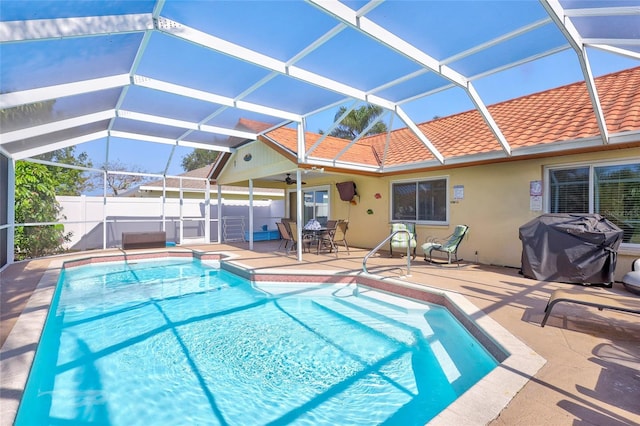 6415 39th Ave W, Bradenton, FL 34209 - view of pool featuring fence, area for grilling, a fenced in pool, a patio area, and a lanai