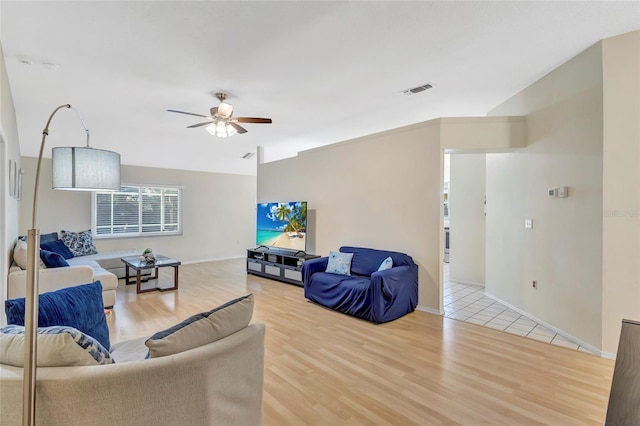 6415 39th Ave W, Bradenton, FL 34209 - living area with light wood-type flooring, baseboards, ceiling fan, and visible vents