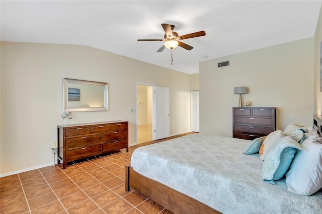 6415 39th Ave W, Bradenton, FL 34209 - bedroom featuring visible vents, lofted ceiling, baseboards, tile patterned floors, and a ceiling fan