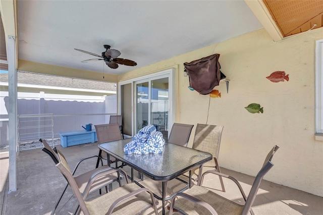 6415 39th Ave W, Bradenton, FL 34209 - view of patio featuring ceiling fan, fence, and outdoor dining space