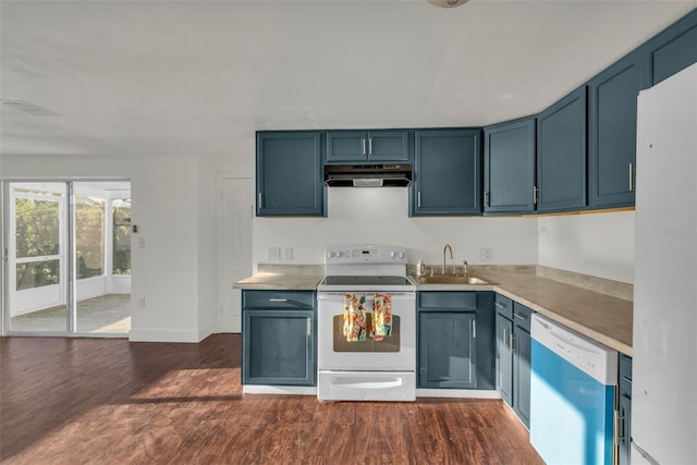 9430 Glen Moor Ln, Port Richey, FL 34668 - kitchen featuring white appliances, under cabinet range hood, a sink, and dark wood-style flooring