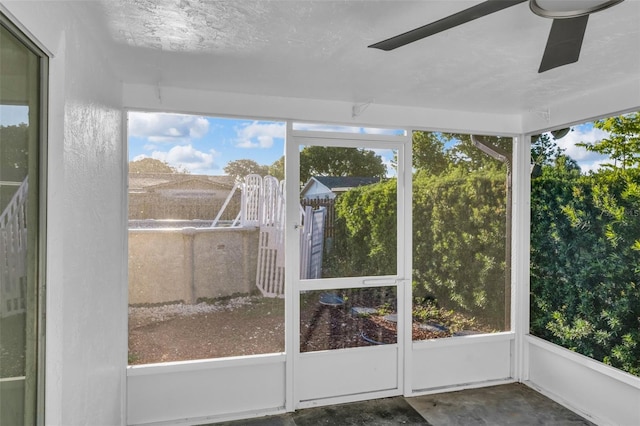 9430 Glen Moor Ln, Port Richey, FL 34668 - unfurnished sunroom with ceiling fan