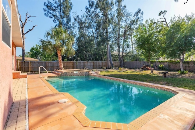 view of pool featuring a yard, a fenced backyard, an in ground hot tub, and a fenced in pool