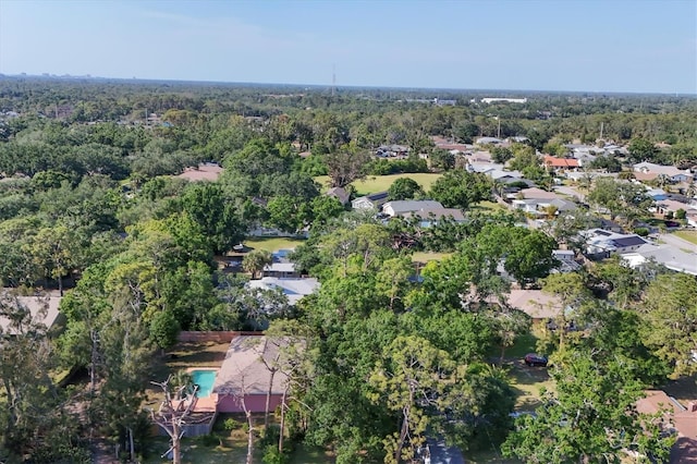 aerial view with a residential view and a wooded view