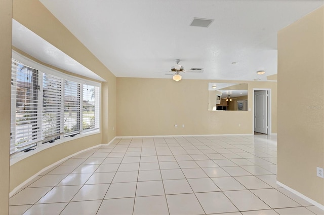 4405 Harbor Blvd, Port Charlotte, FL 33952 - unfurnished room with ceiling fan, light tile patterned floors, and baseboards