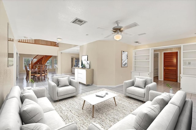 4405 Harbor Blvd, Port Charlotte, FL 33952 - living area featuring light tile patterned floors, a ceiling fan, and built in features