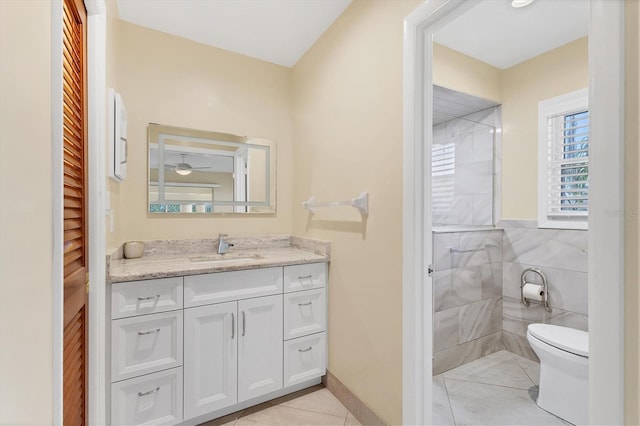4405 Harbor Blvd, Port Charlotte, FL 33952 - bathroom featuring tile patterned floors, vanity, toilet, and tiled shower
