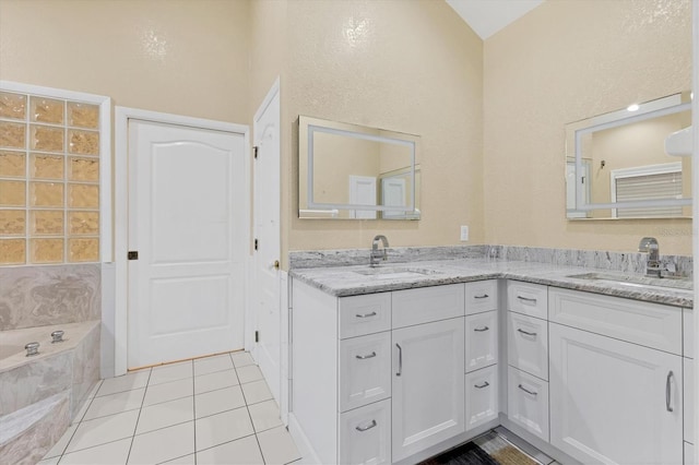 4405 Harbor Blvd, Port Charlotte, FL 33952 - full bathroom featuring double vanity, a bath, and tile patterned floors