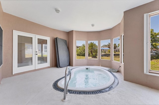 4405 Harbor Blvd, Port Charlotte, FL 33952 - sunroom with french doors and a jacuzzi