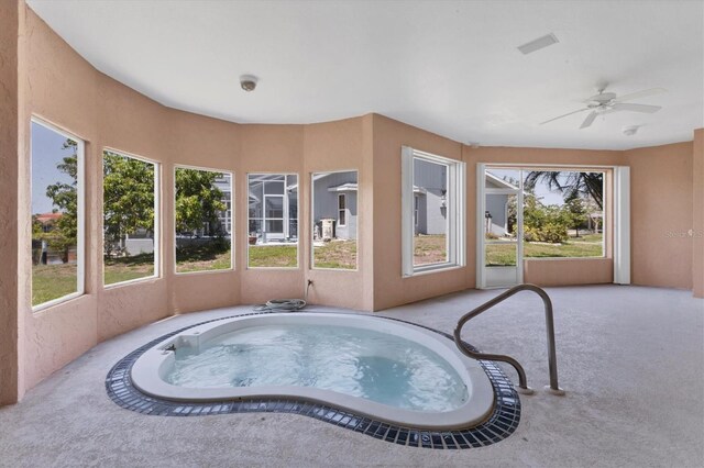 4405 Harbor Blvd, Port Charlotte, FL 33952 - sunroom / solarium featuring a hot tub and healthy amount of natural light